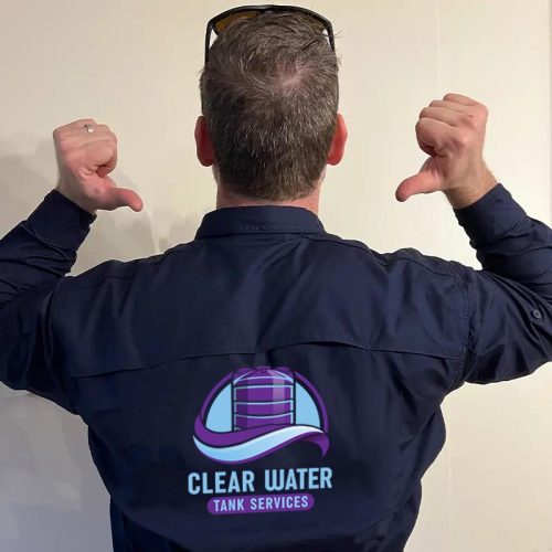 Clearwater Tank Services technician wearing branded uniform showcasing Clear Water Tank Servicing details